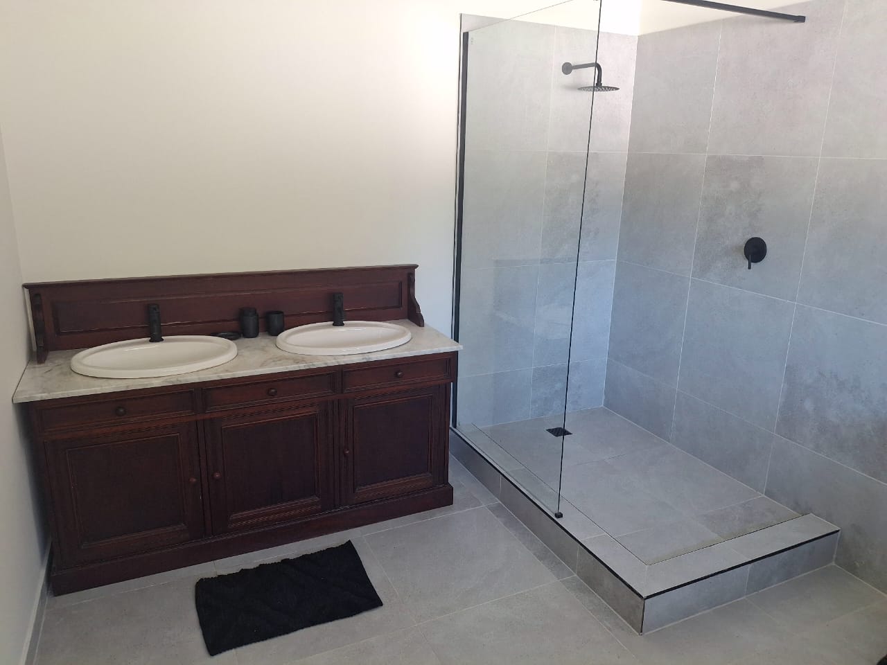 Completed Durban bathroom renovation with double vanity and walk-in shower